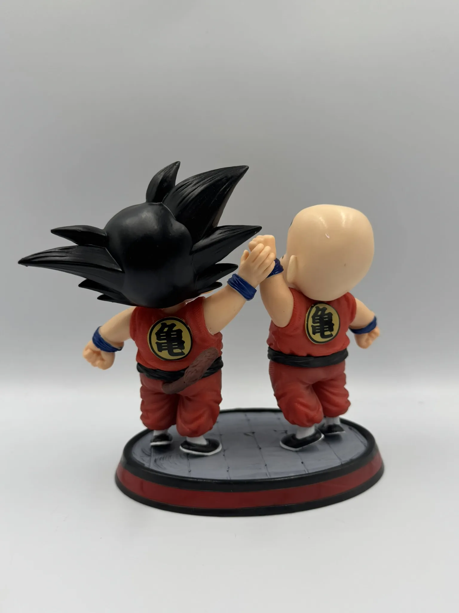 Figura Goku y Krilin con Base