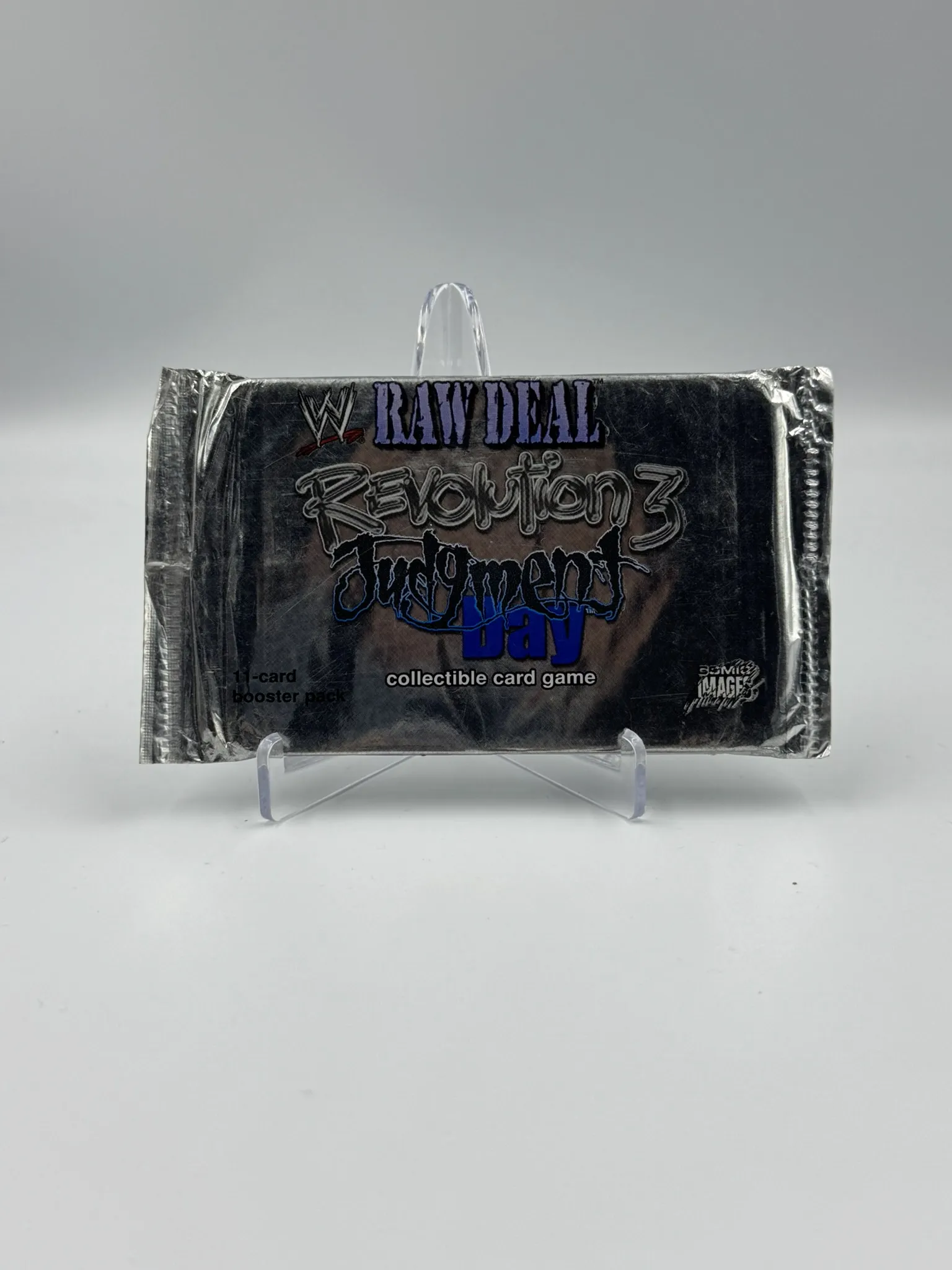 Raw deal revolution Judgement Day (cartas) sobre Plateado